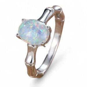 Silver Bamboo Opal Pendant Ring Size 6

Brand New